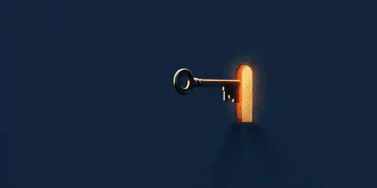 Key in a lock representing a client taking ownership of their own website